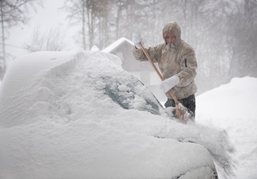 person shoveling snow